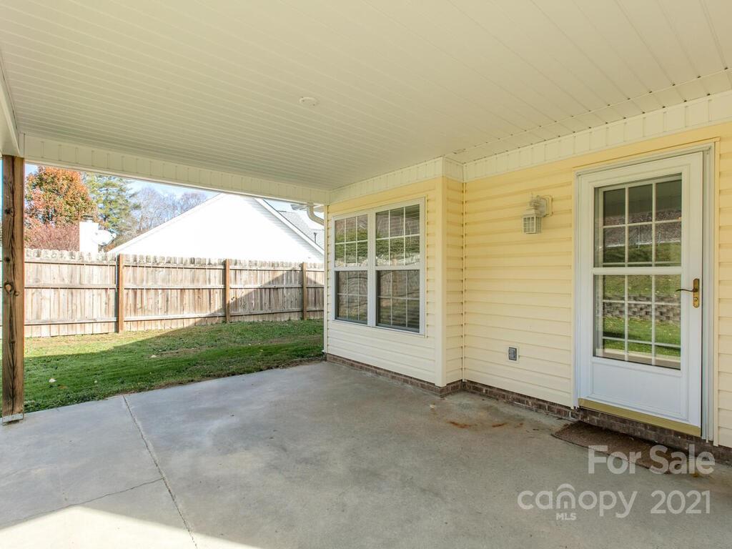 83 Planters Creek Road Fletcher, NC 28732 - Photo 33 of 38 a view of a house with a garden