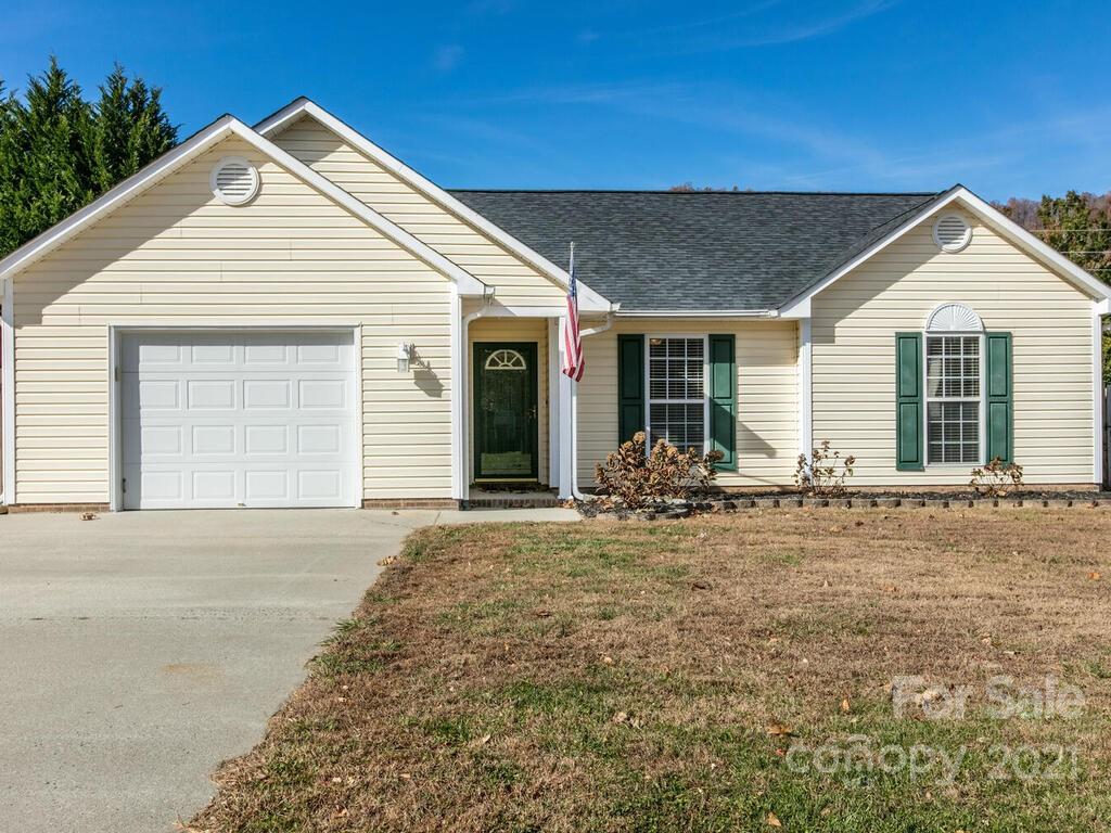 83 Planters Creek Road Fletcher, NC 28732 - Photo 38 of 38 a view of a house with a yard