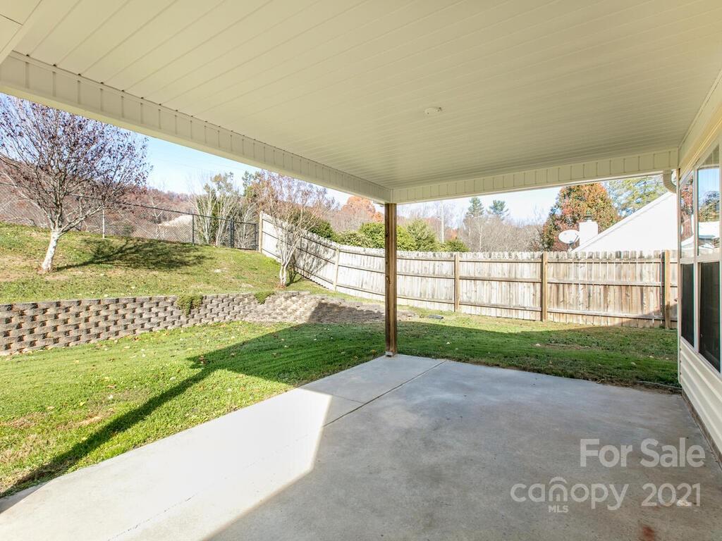 83 Planters Creek Road Fletcher, NC 28732 - Photo 6 of 38 a view of a back yard
