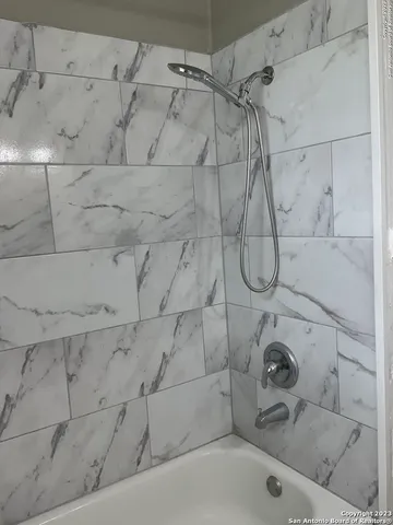 a bathroom with a bathtub