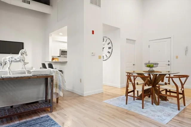 a workspace with furniture and wooden floor