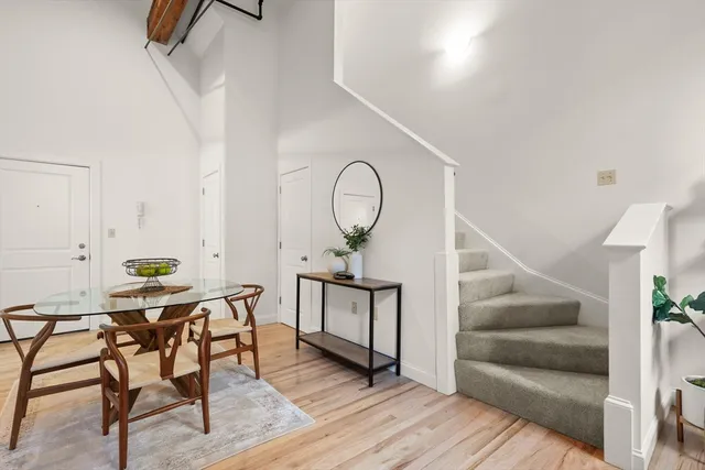 a view of a livingroom with furniture and wooden floor