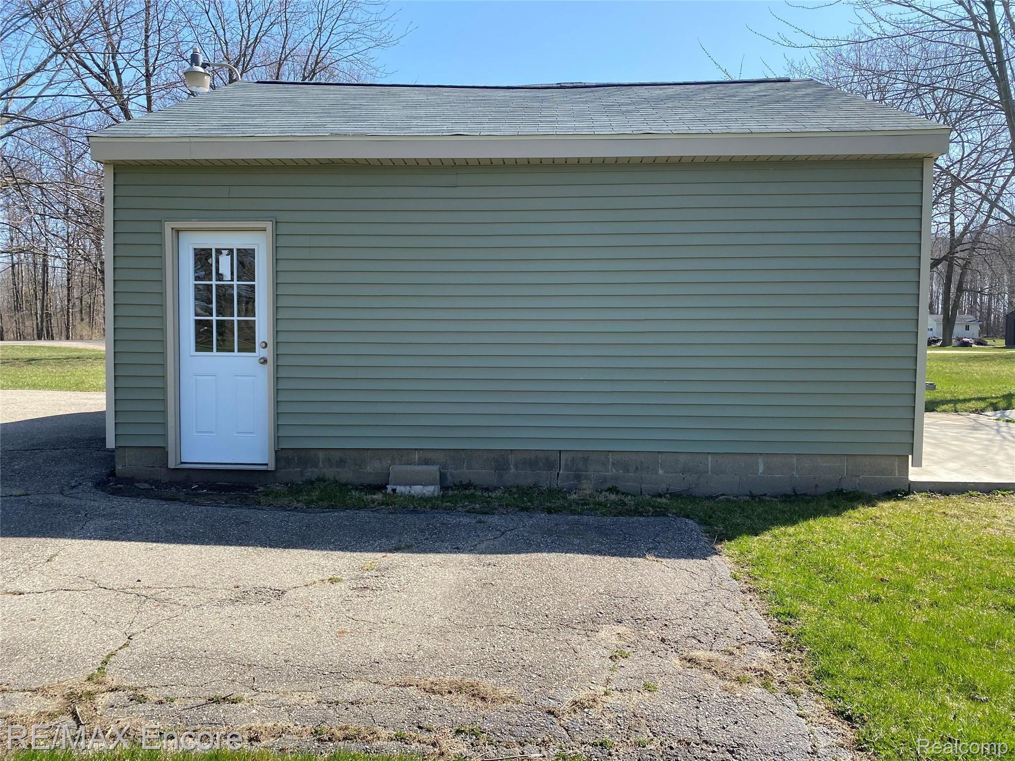 8060 Newburg Road Durand, MI 48429 - Photo 4 of 41 Extra parking space for your RV, boat, trailer, or whatever you choose.