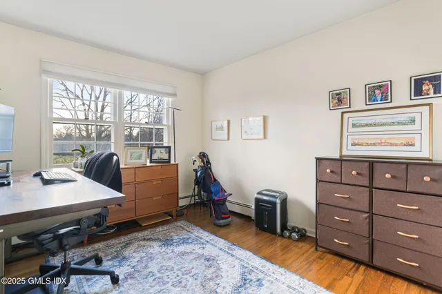 a room with furniture and a window