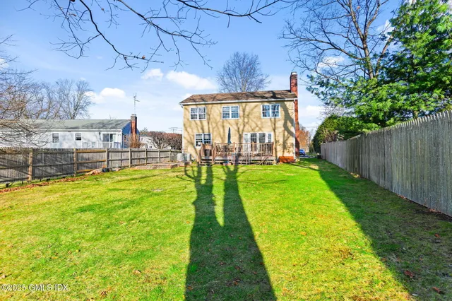 a view of yard with swimming pool