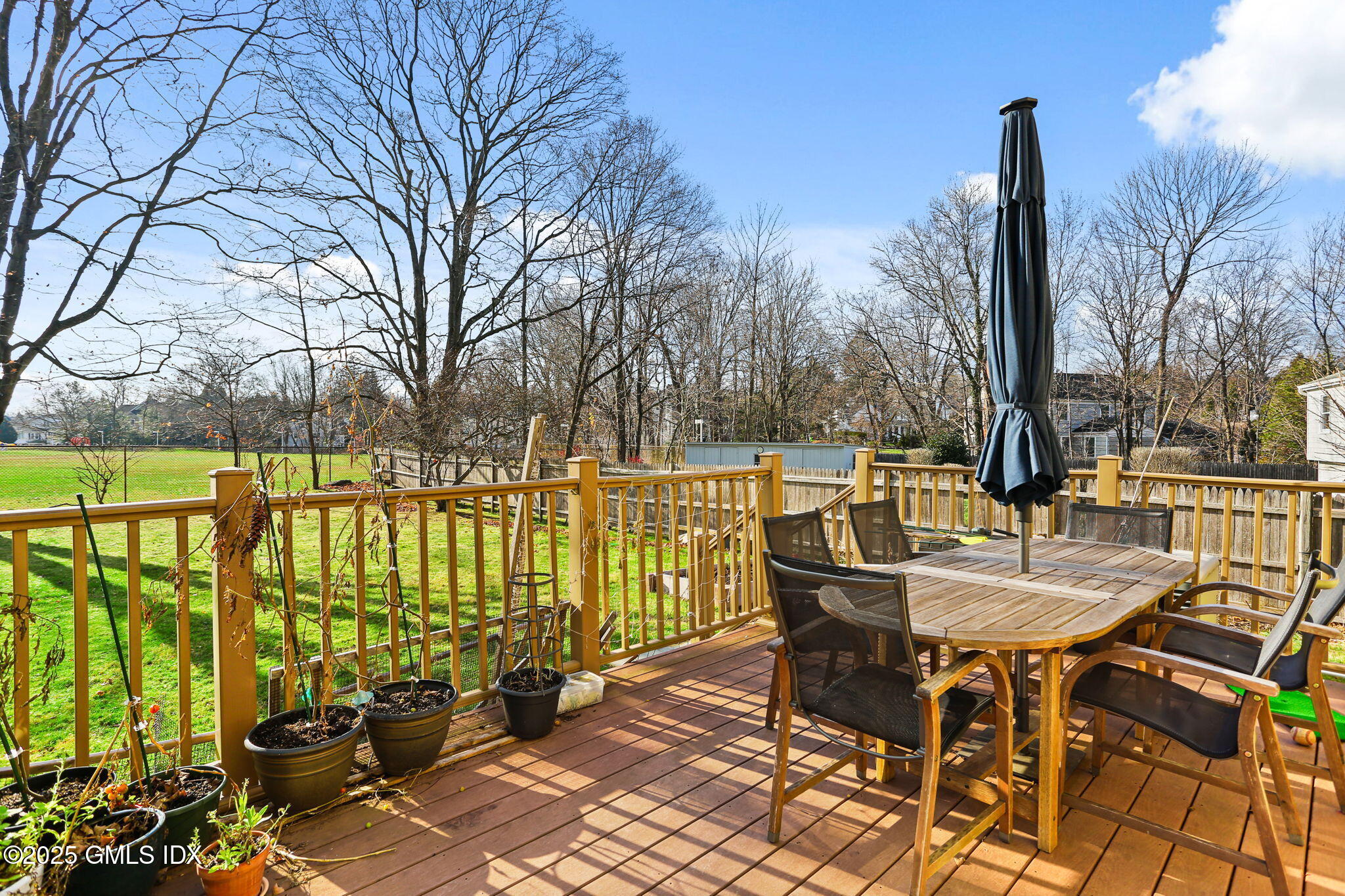 38 A Orchard Street Cos Cob, CT 06807 - Photo 24 of 26 a view of a patio with iron fence