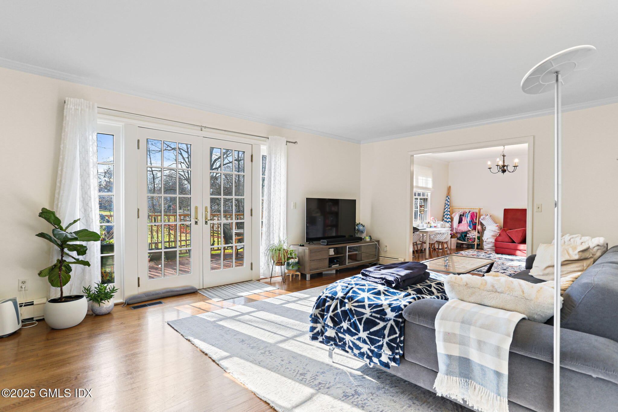 38 A Orchard Street Cos Cob, CT 06807 - Photo 5 of 26 a living room with furniture and a flat screen tv