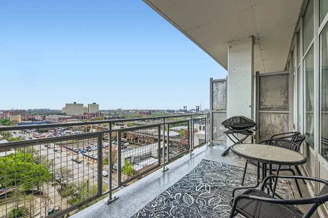 a view of city with tall buildings