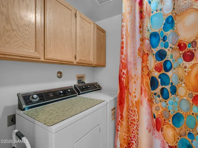 a kitchen with a stove a sink and a refrigerator