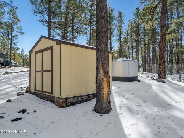 a view of a mountain range with lush green forest