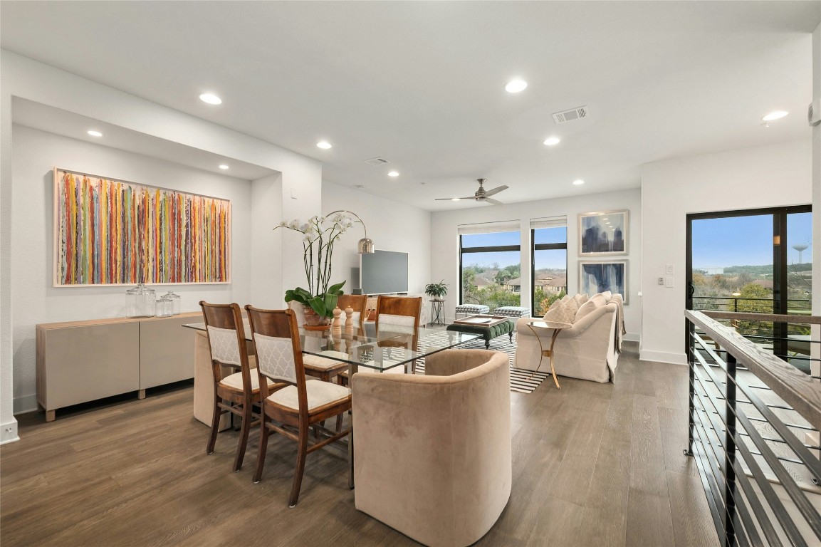 2050 Lohmans Spur Road, Unit 101 Lakeway, TX 78738 - Photo 7 of 31 a very nice looking living room with furniture and a large window