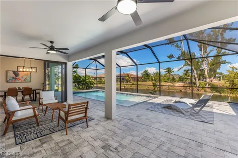 a view of a chairs and table in a room