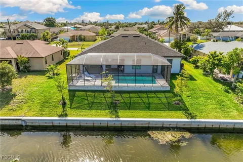 a small pool is sitting in the middle of a lake