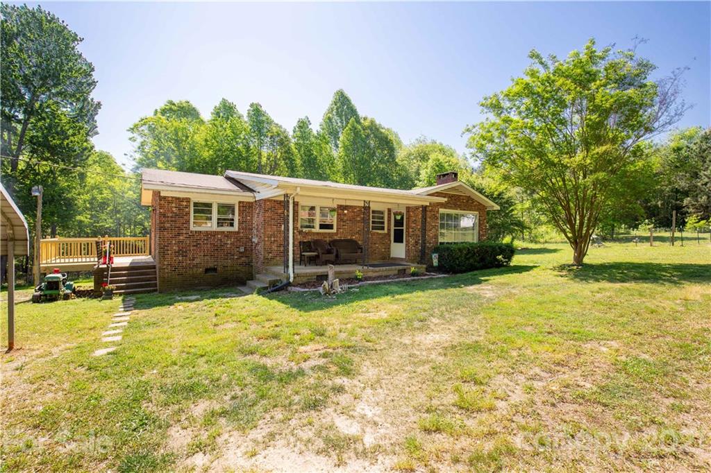 120 Ramah Church Road Clover, SC 29710 - Photo 2 of 18 a view of a house with swimming pool and sitting area