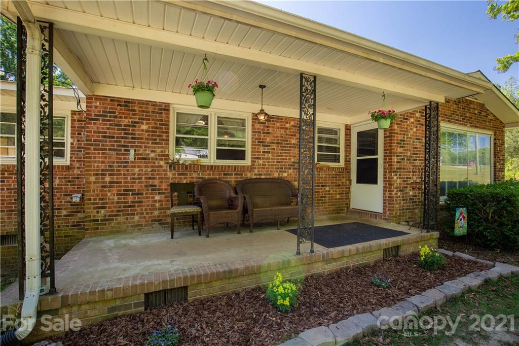 120 Ramah Church Road Clover, SC 29710 - Photo 4 of 18 a front view of a house with outdoor seating