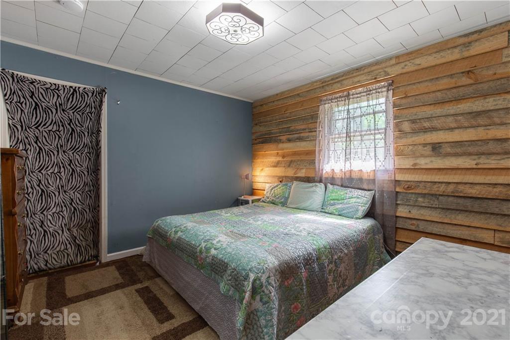 120 Ramah Church Road Clover, SC 29710 - Photo 8 of 18 a bedroom with a bed and a window