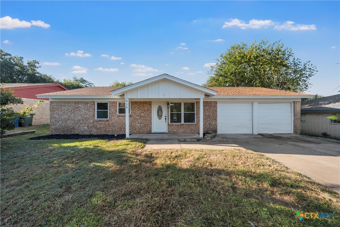 914 Edwards Street Copperas Cove, TX 76522 - Photo 5 of 13 a front view of a house with a garden