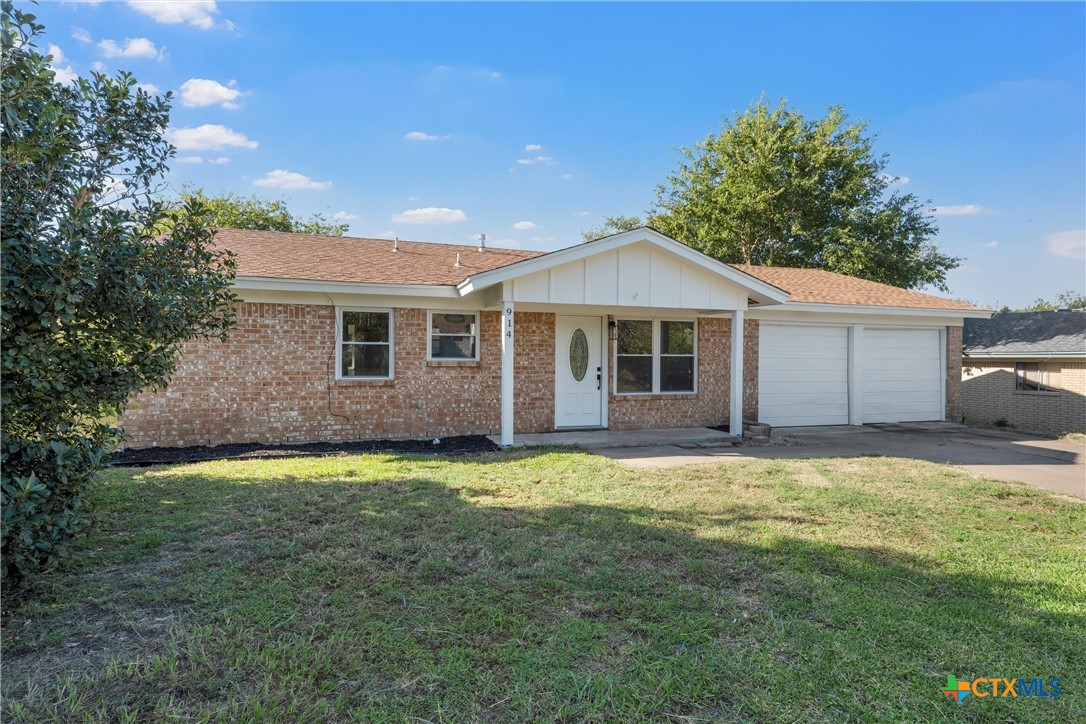 914 Edwards Street Copperas Cove, TX 76522 - Photo 6 of 13 a backyard of a house with yard barbeque oven and outdoor seating