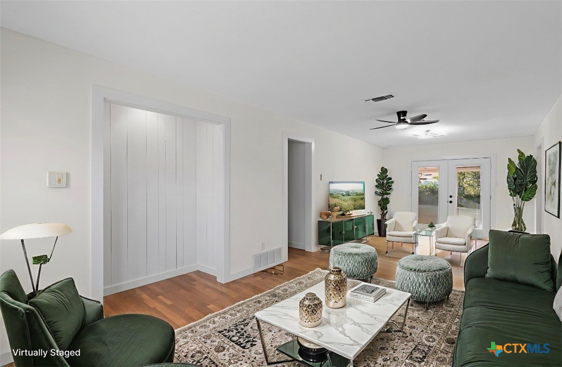 914 Edwards Street Copperas Cove, TX 76522 - Photo 7 of 13 a living room with furniture and a table