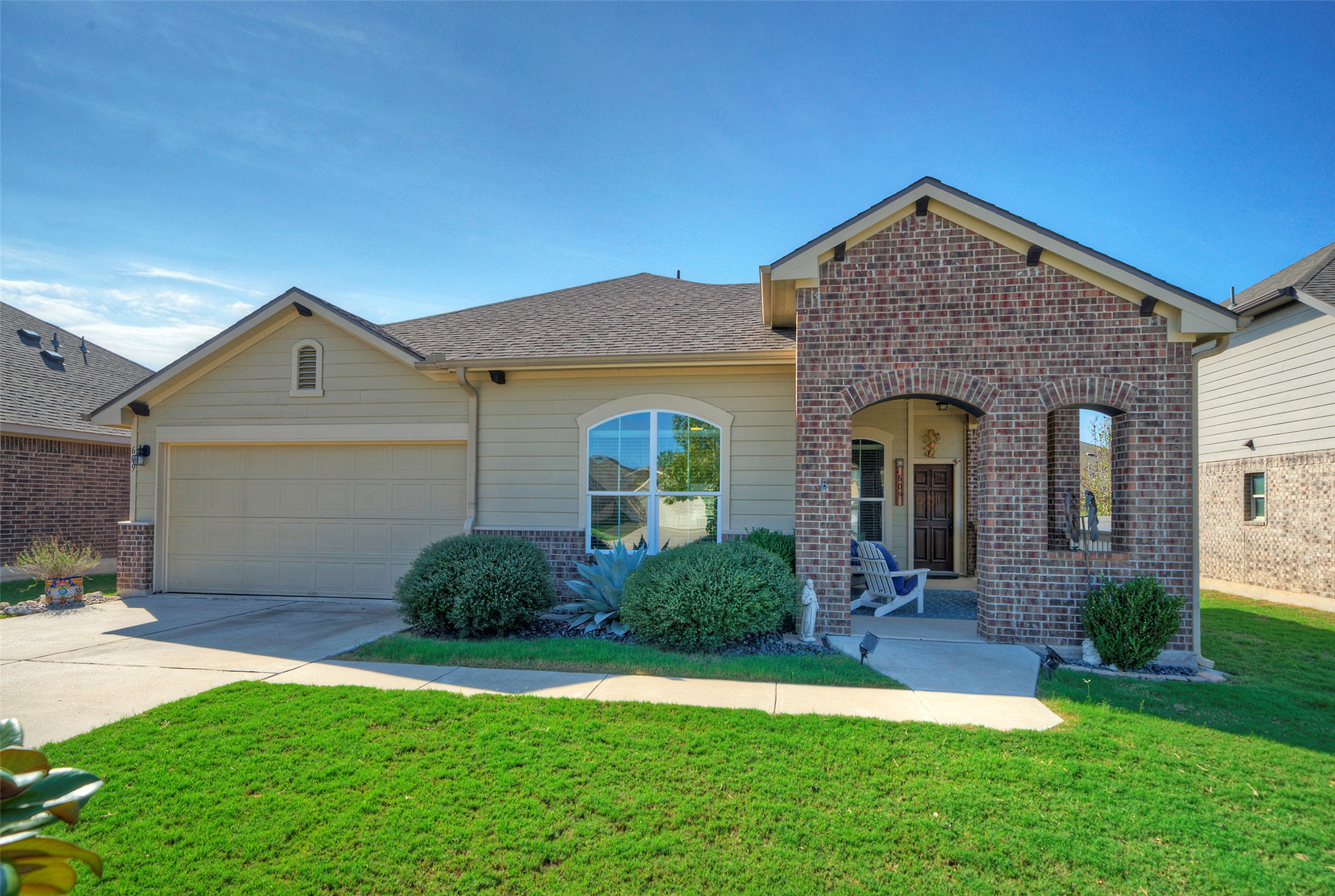 609 Noatak Trail Pflugerville, TX 78660 - Photo 1 of 1 a front view of a house with a yard and garage