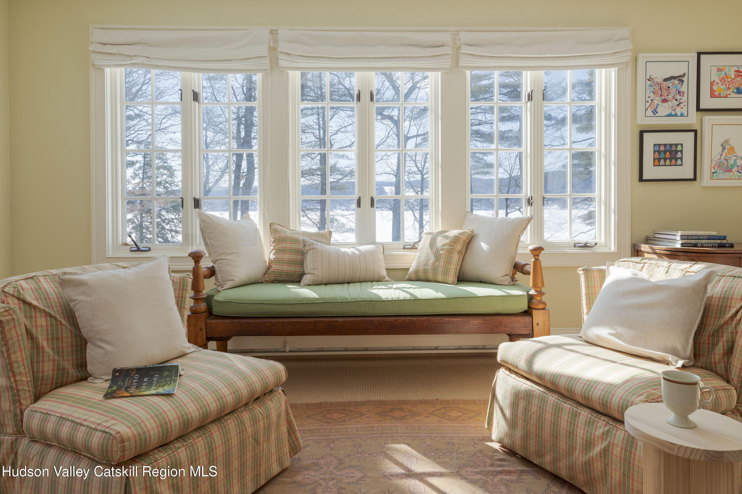 196 Wellington Lane Cooperstown, NY 13326 - Photo 25 of 57 a living room with furniture and a large window