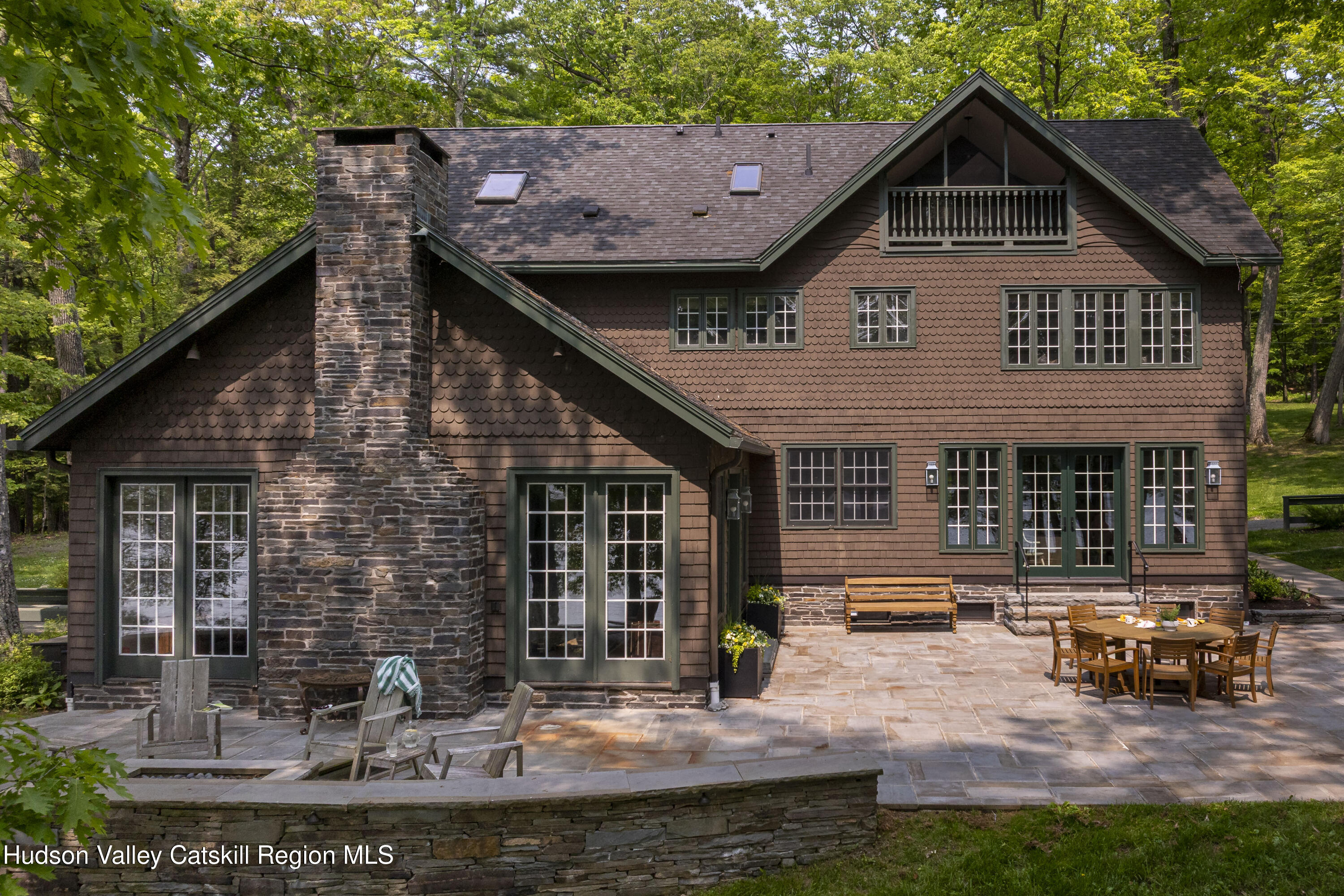 196 Wellington Lane Cooperstown, NY 13326 - Photo 3 of 57 a view of a house with backyard porch and sitting area