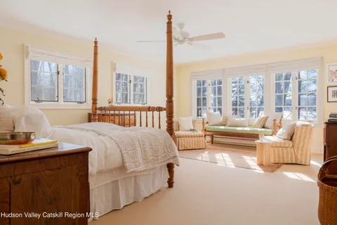a view of an house with backyard porch and sitting area