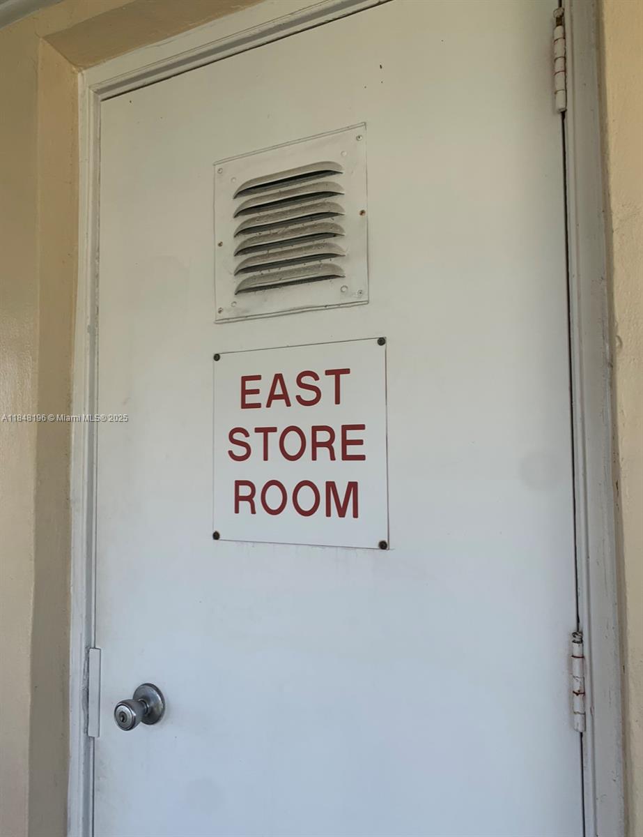 900 Atlantic Shores Boulevard, Unit 215 Hallandale Beach, FL 33009 - Photo 32 of 58 a close up of a sign