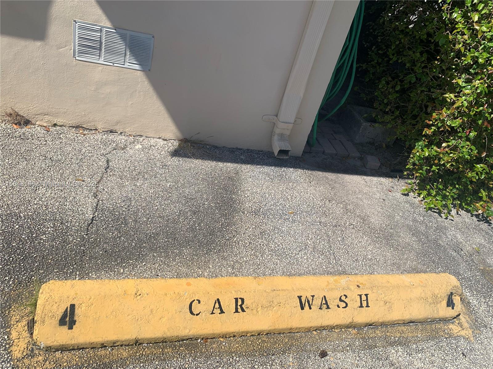 900 Atlantic Shores Boulevard, Unit 215 Hallandale Beach, FL 33009 - Photo 33 of 58 CAR WASH on side of building