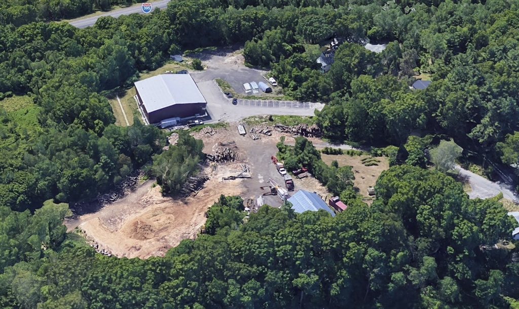 9 B Wellington Road Oxford, MA 01540 - Photo 1 of 6 an aerial view of residential house with outdoor space and trees all around
