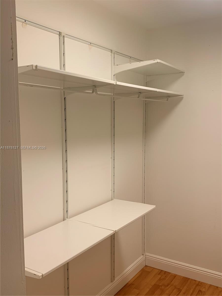 16500 Golf Club Road, Unit 101 Weston, FL 33326 - Photo 20 of 44 a view of a room with shelf