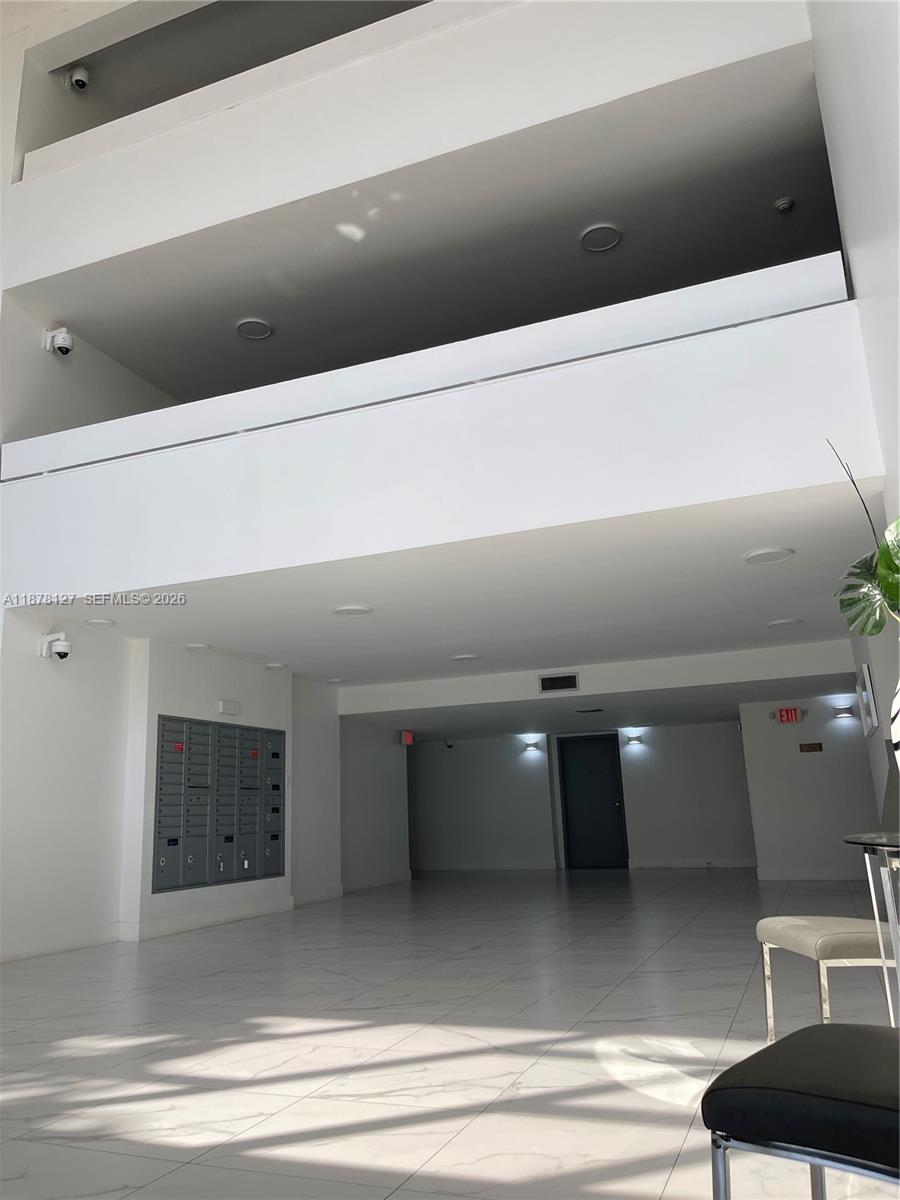 16500 Golf Club Road, Unit 101 Weston, FL 33326 - Photo 41 of 44 a view of a hallway