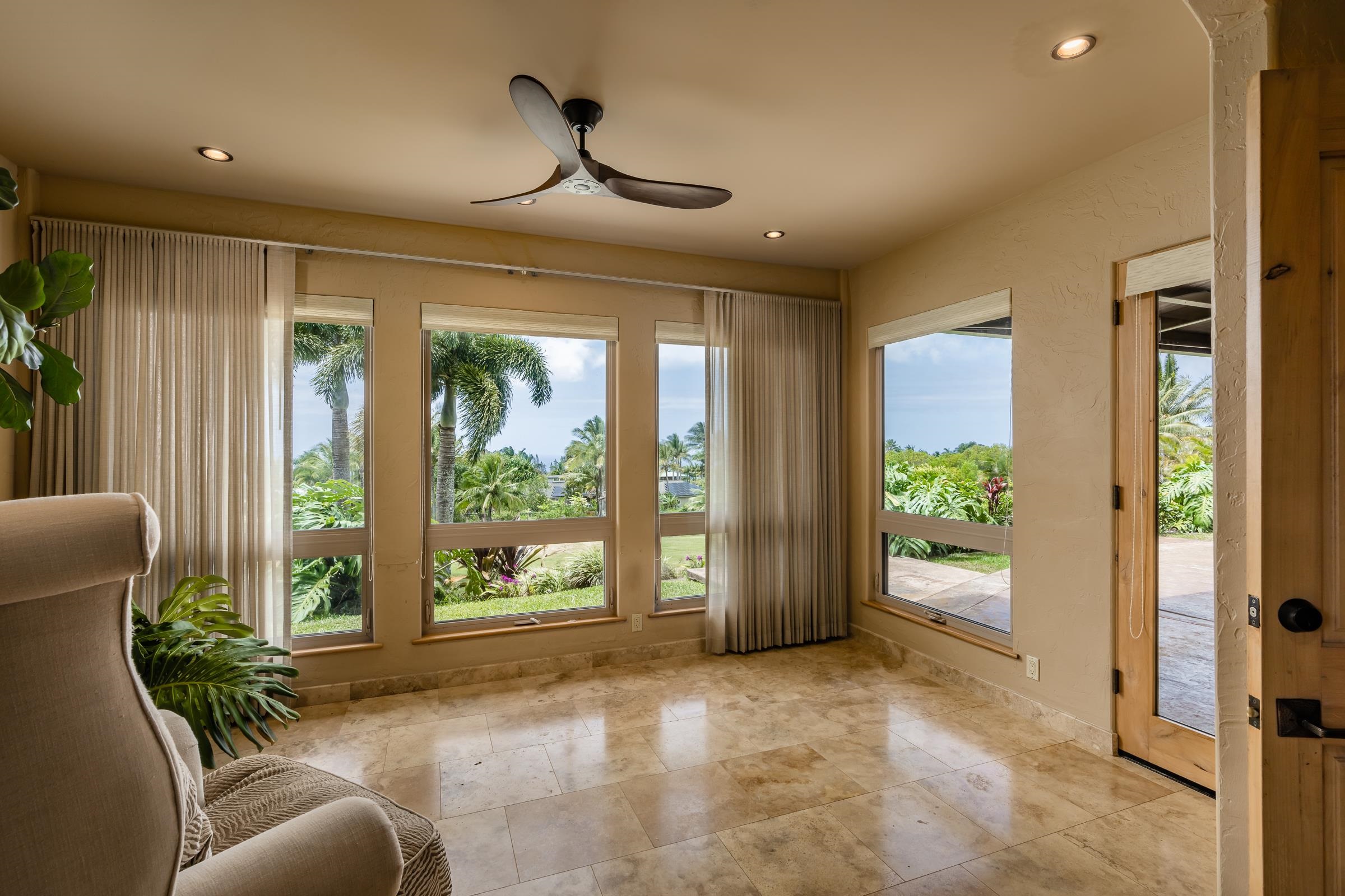 785 West Kuiaha Road Haiku, HI 96708 - Photo 15 of 49 a living room with furniture and a large window