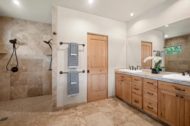 a view of an entryway with wooden floor and windows