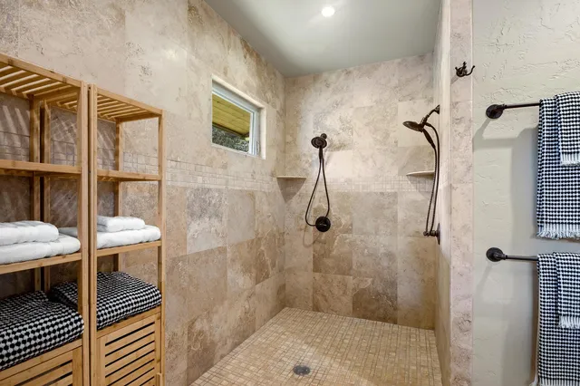 a view of a chair and table in the balcony