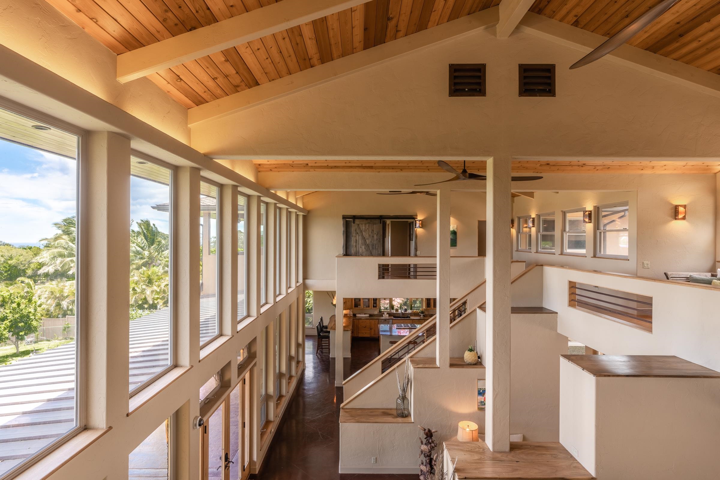 785 West Kuiaha Road Haiku, HI 96708 - Photo 22 of 49 a view of an entryway with wooden floor and windows