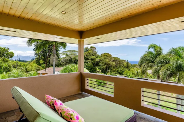 a view of a swimming pool with a yard