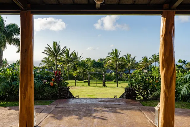 a bathroom with a sink vanity mirror and toilet