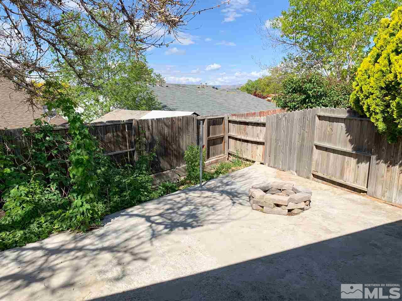 6809 Flower Street Reno, NV 89506 - Photo 14 of 15 a view of a backyard of a house