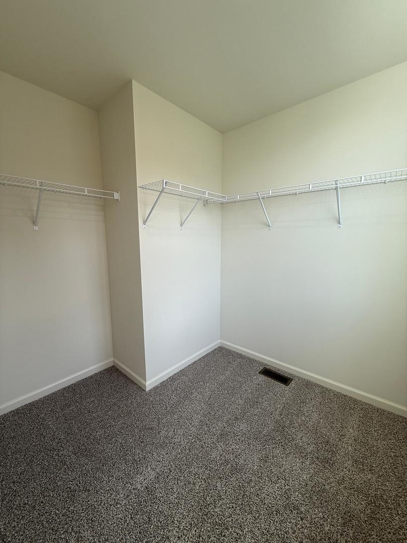 347 Summit Circle Lombard, IL 60148 - Photo 11 of 18 a view of a room with shelf on the wall