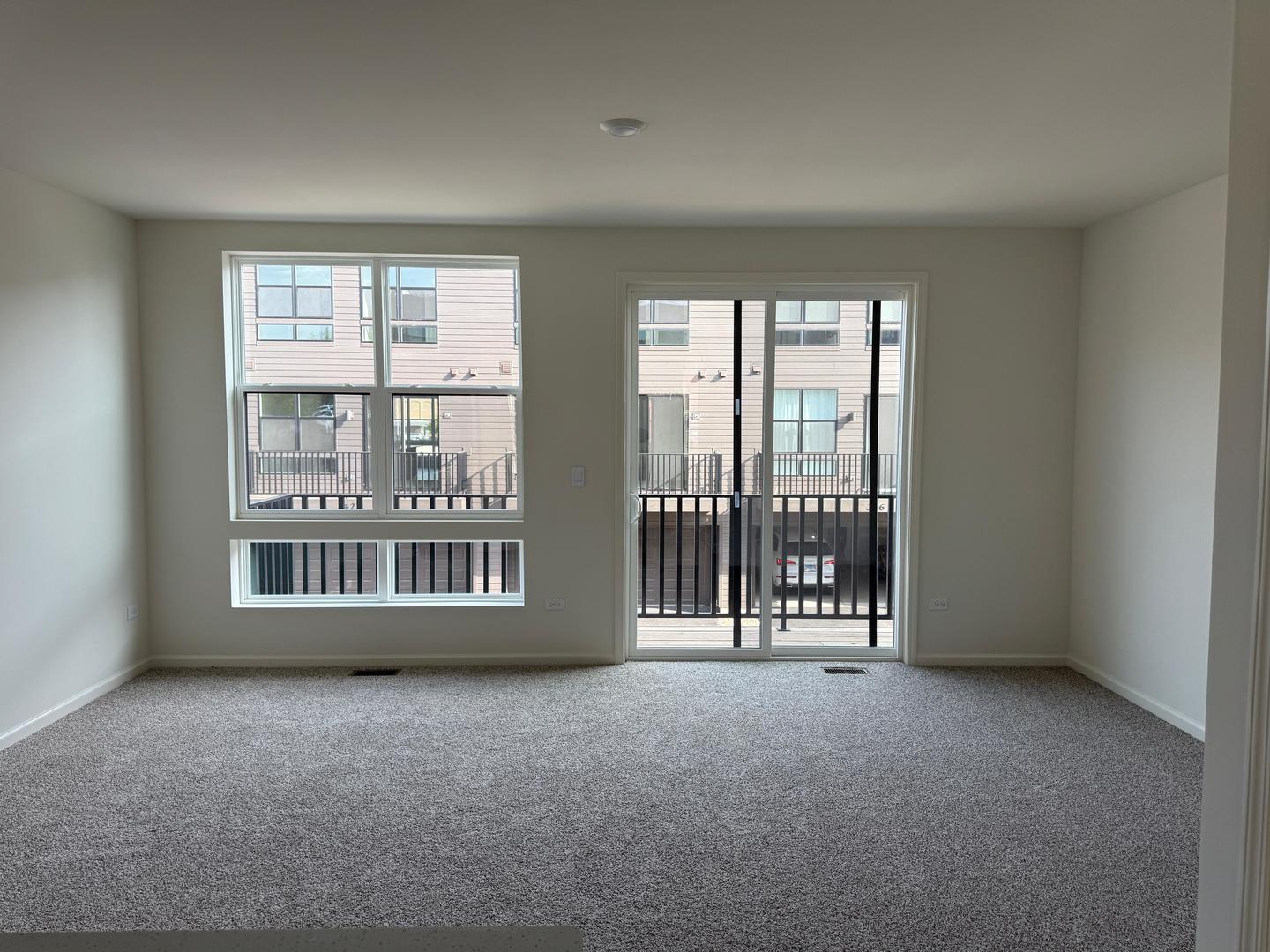 347 Summit Circle Lombard, IL 60148 - Photo 6 of 18 a view of an empty room with a window