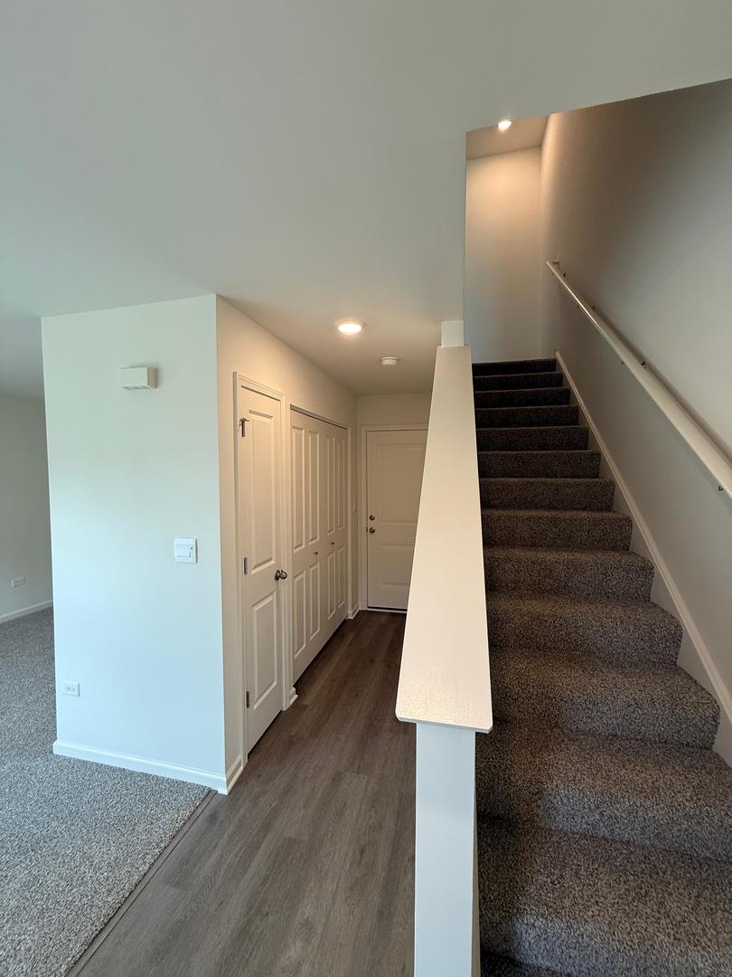 347 Summit Circle Lombard, IL 60148 - Photo 8 of 18 a view of entryway and hall with wooden floor