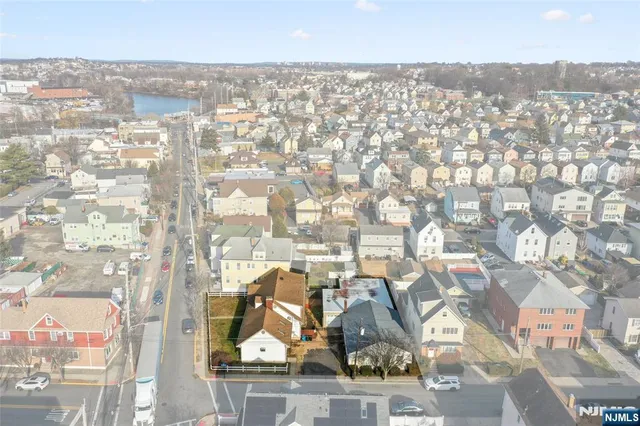 an aerial view of residential building with parking space