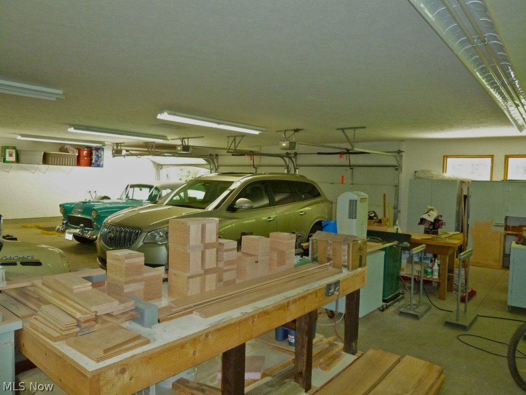 6432 Fay Road Painesville, OH 44077 - Photo 17 of 25 The attached garage can hold up to 9 cars!
