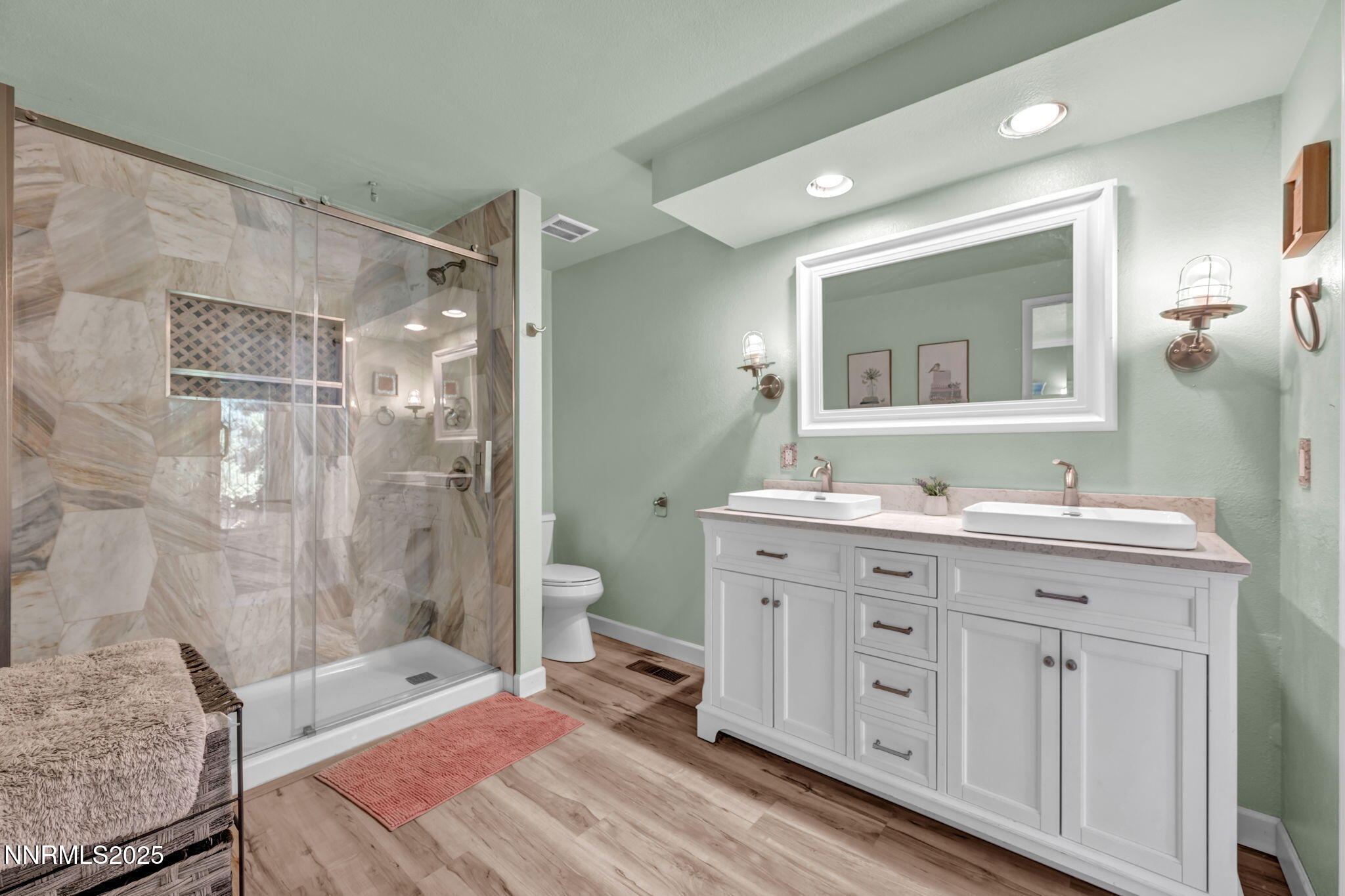 3495 West Plumb Lane Reno, NV 89509 - Photo 21 of 38 a spacious bathroom with a double vanity sink mirror double and shower