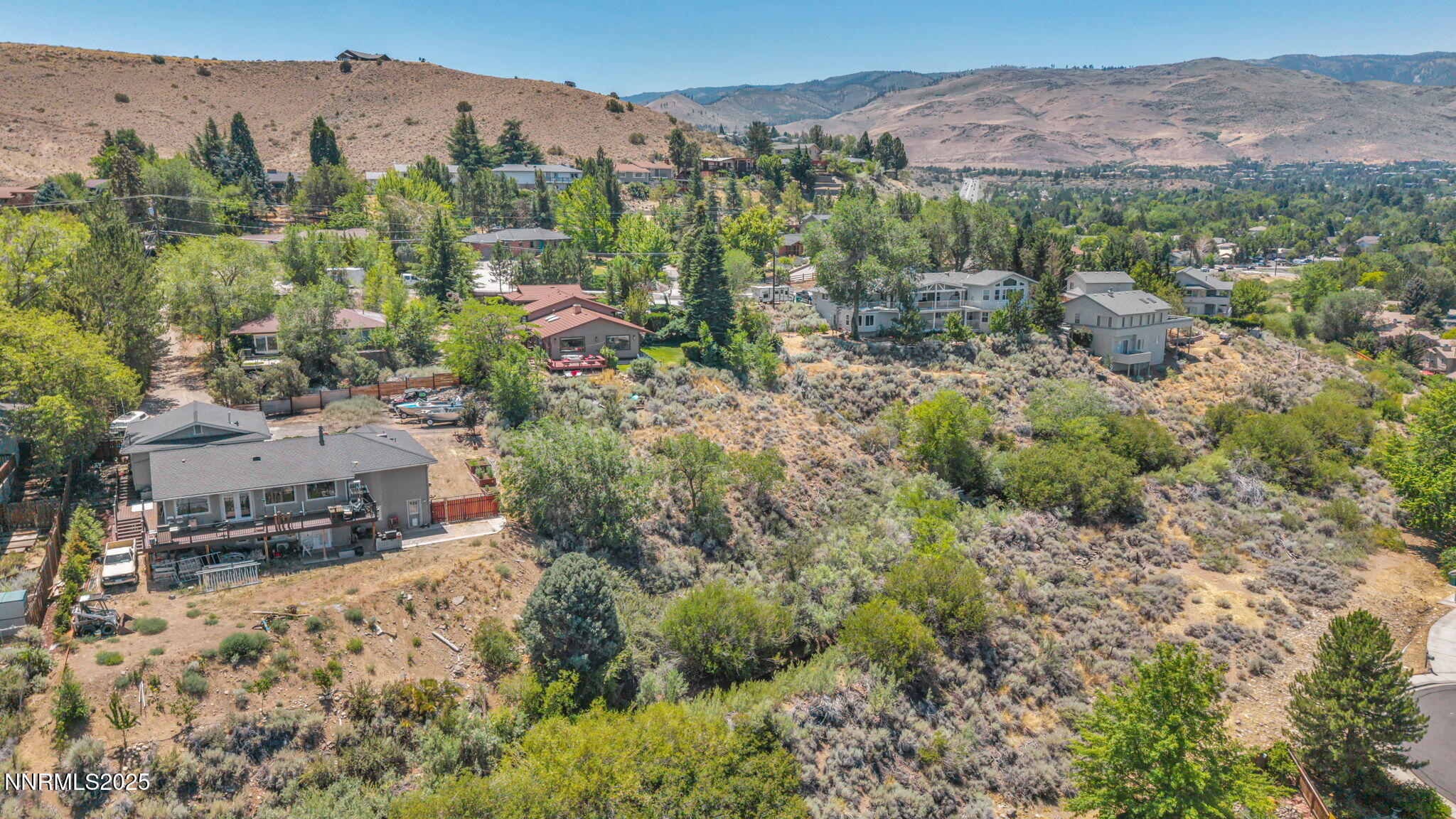 3495 West Plumb Lane Reno, NV 89509 - Photo 30 of 38 an aerial view of residential house with outdoor space