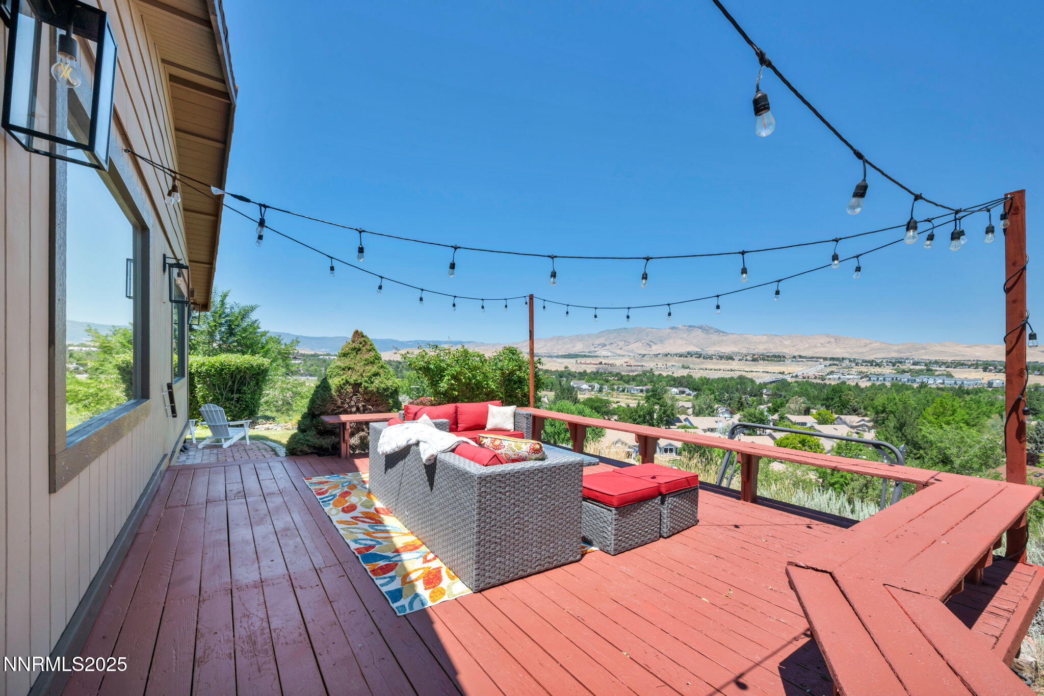3495 West Plumb Lane Reno, NV 89509 - Photo 33 of 38 a sitting area with furniture on wooden deck