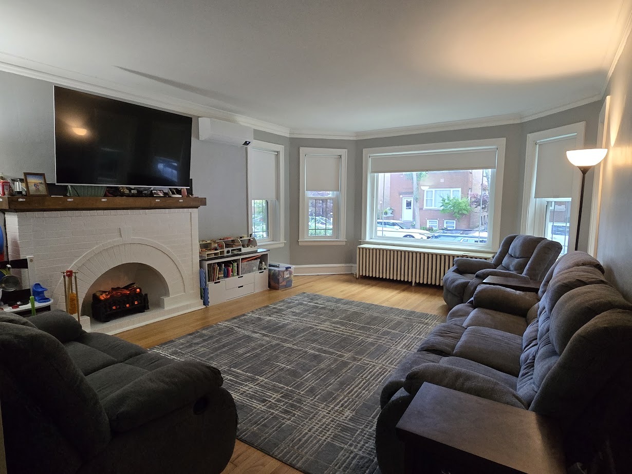 5910 North Campbell Avenue Chicago, IL 60659 - Photo 3 of 14 a living room with furniture and a flat screen tv