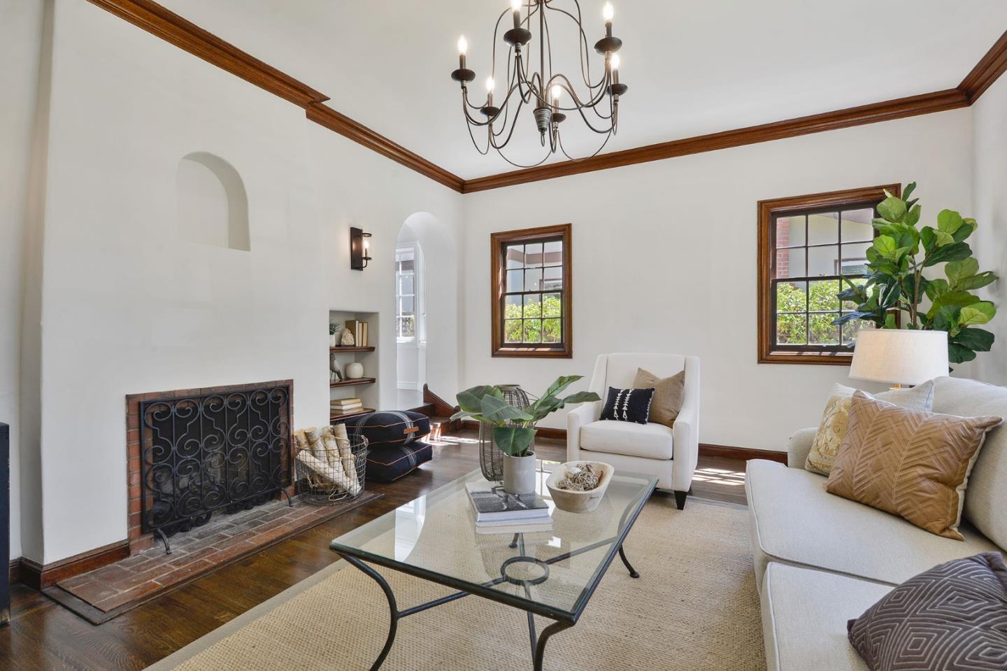 22 Channing Road Burlingame, CA 94010 - Photo 8 of 46 a living room with furniture a fireplace and a chandelier