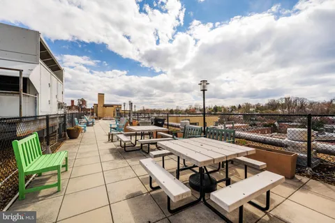 a view of a terrace with furniture